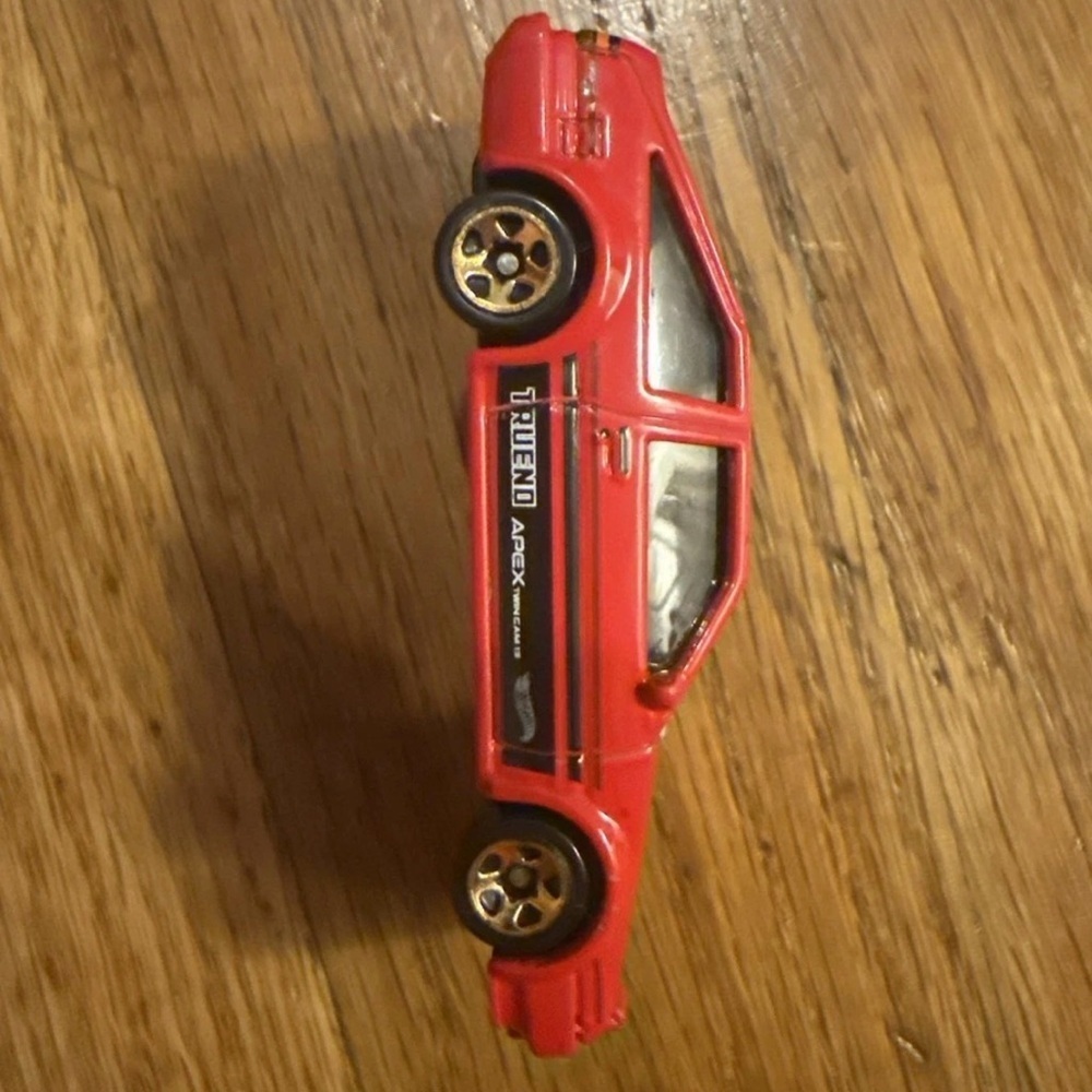 Speedy Red Toy Car with Gold Accents - Picture 2 of 4